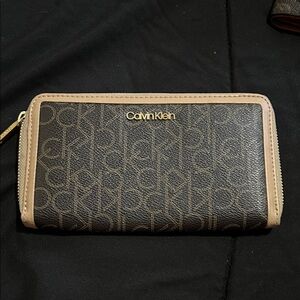 Calvin Klein Black and Tan Zip Wallet